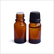 Molded essential oil bottle with cap