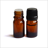 Molded essential oil bottle with cap